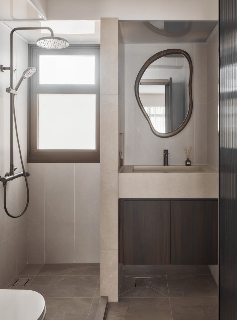 Singapore bathroom interior featuring sleek fixtures and elegant finishes