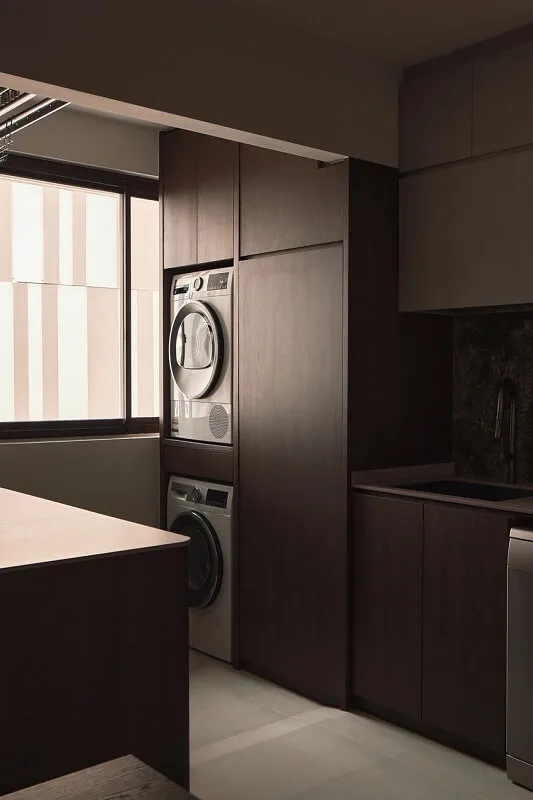 Elegant wood cabinets and table with a well-designed layout, creating a functional and stylish living space.