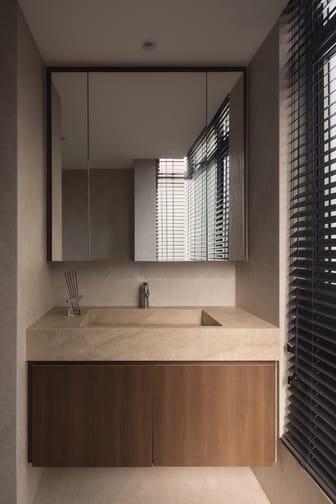 12 Keppel Bay condo bathroom with luxe interior design, handwash basin, mirror, and elegant modern finishes.