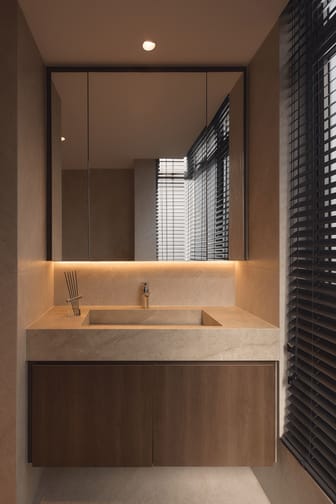 12 Keppel Bay condo comfort room with luxe interior design, stylish handwash basin, mirror, and elegant modern finishes.